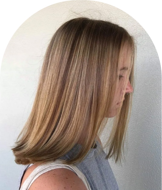 A Woman with a Brown Short Hair — Hair Salon in Darwin, NT